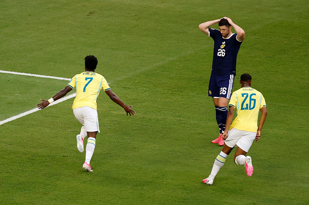 Vinicius fires Brazil into World Cup knockouts with 3-0 win over Scotland