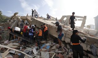 Venezuela quake death toll nears 1,500 as rescue work goes on