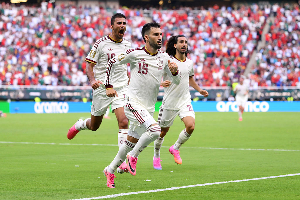 Baena strike sends Spain past Uruguay into World Cup knockouts