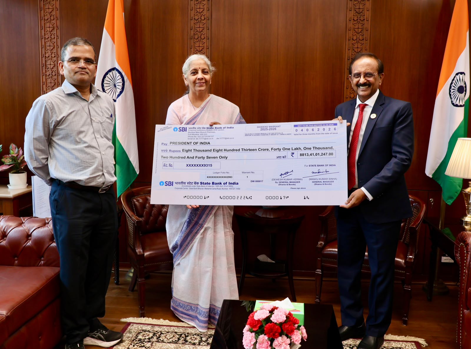 SBI hands over Rs 8,813 cr dividend cheque to govt for FY26