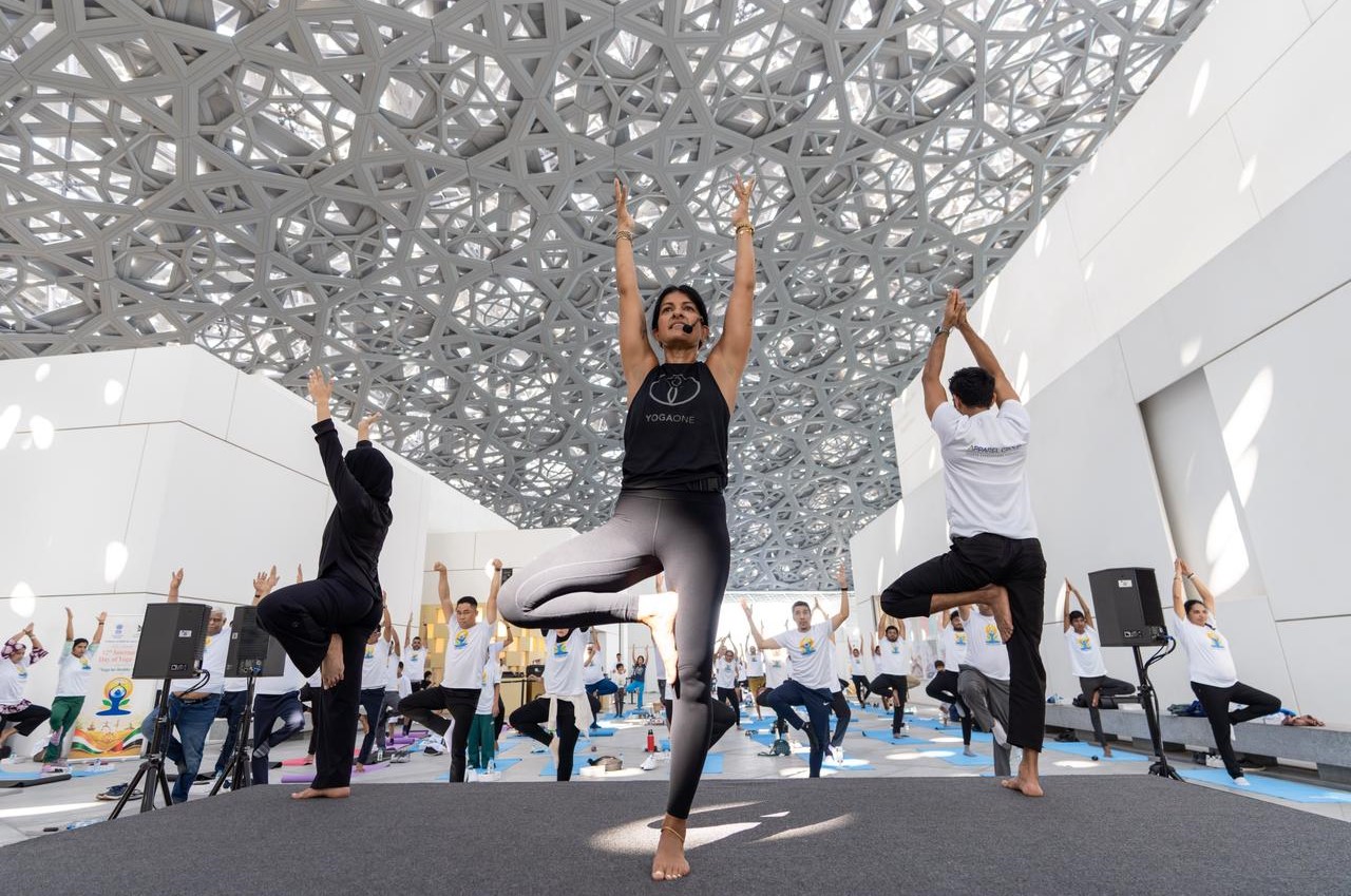 Yoga enthusiasts gather under Louvre Abu Dhabi dome to mark International Yoga Day