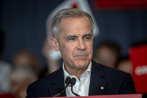 Carney defends free trade after Trump imposes 50% tariff on select Canadian goods