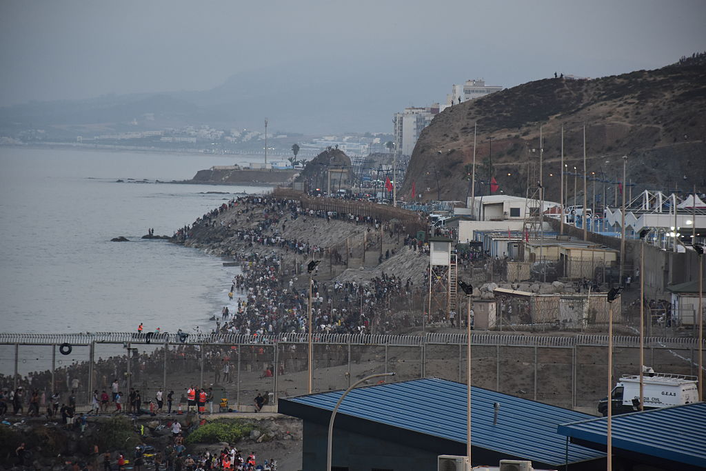 Migrants pour into Spain’s Ceuta from Morocco, military called in