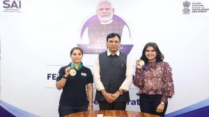 Mansukh Mandaviya felicitates ISSF World Cup champions Esha Singh and Neeru Dhanda