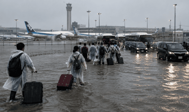 Japan's record rains strand thousands at Narita airport; kill eight