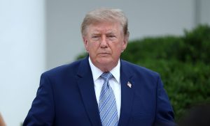 US threatens countries doing business with Iran, but holds off on penalties for now