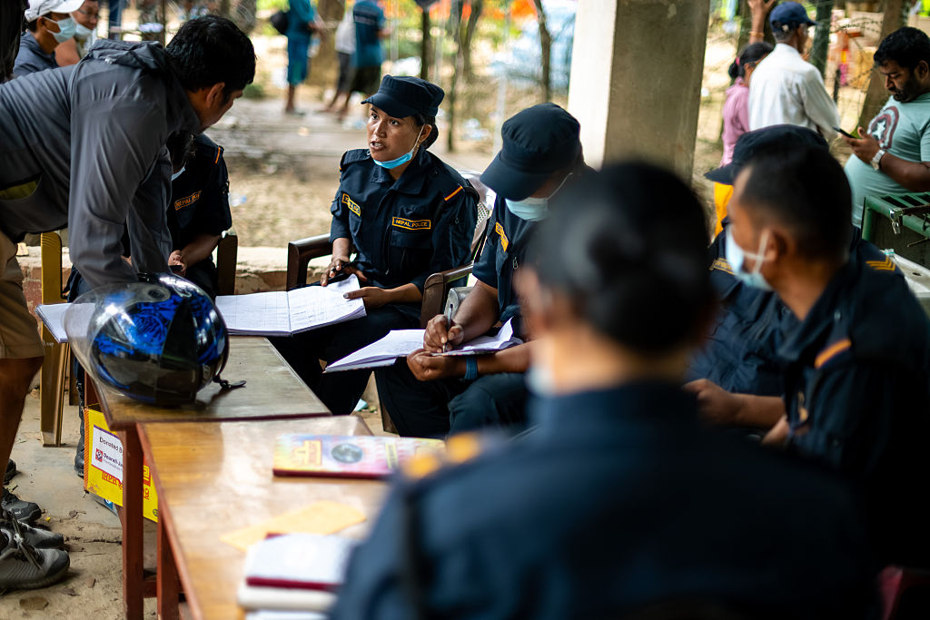 Security forces lead search and rescue operation following deadly flash flood in Nepal
