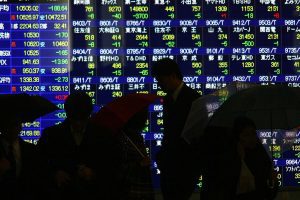 Oil slumps on hopes of Iran deal, yen spikes suddenly after intervention