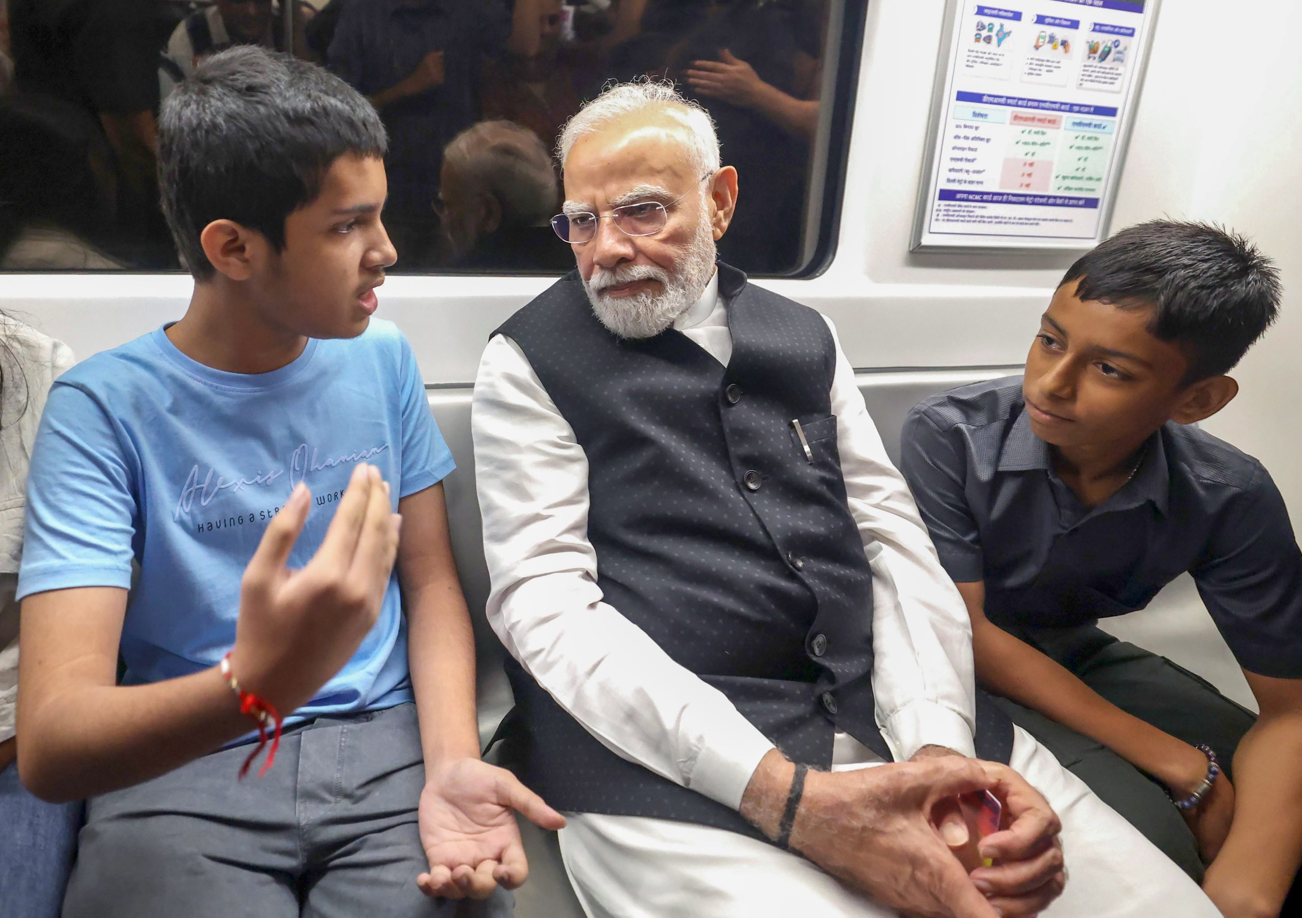 PM Modi’s ride in Delhi Metro happily surprises children, co-passengers