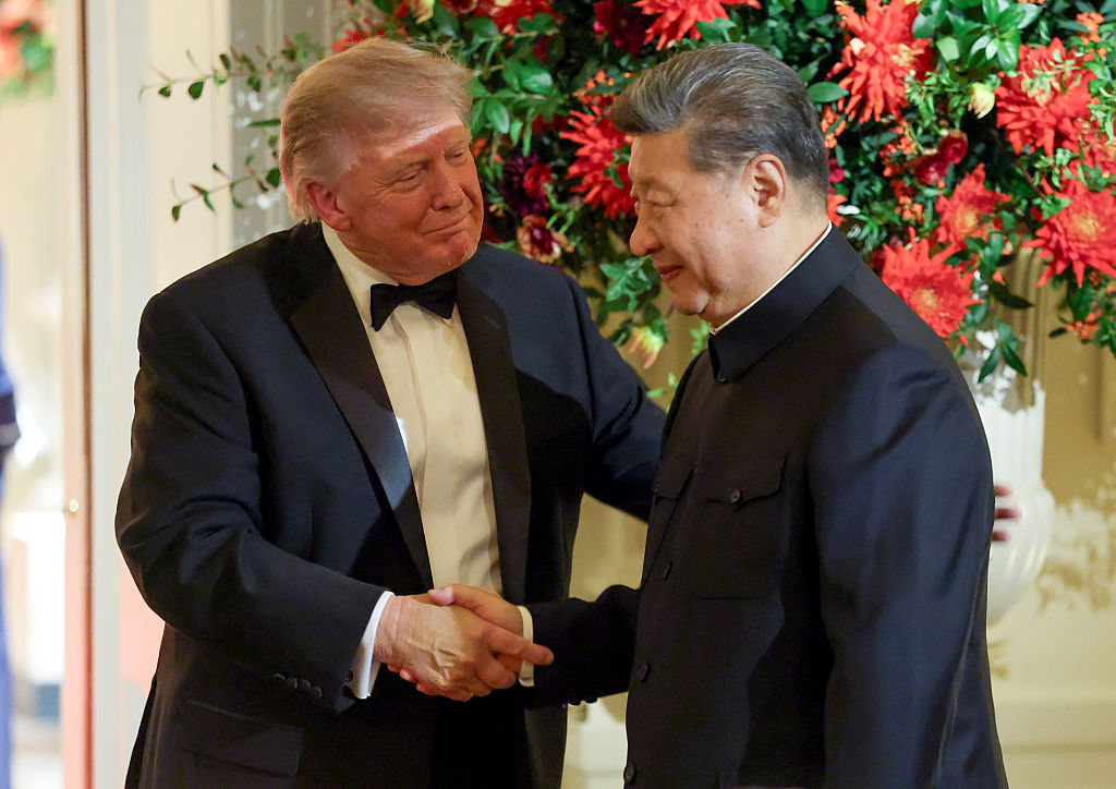 Trump, Xi wrap up summit with tea and tour of US archives
