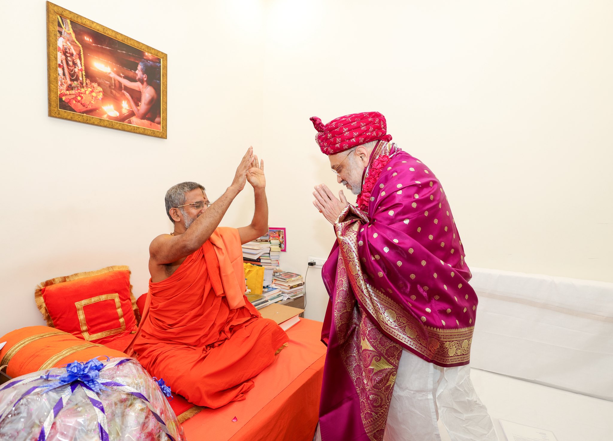 Amit Shah meets Pejawar Mutt Seer Sri Vishwaprasanna Teerth Swami in New Delhi