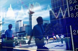 Stocks trade cautiously in Asia, Brent off six-month top