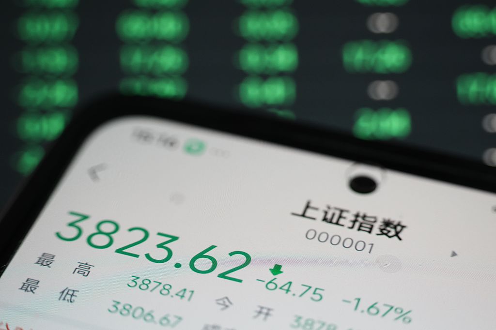 Asian shares track Wall Street higher, Treasury yields near multi-decade highs