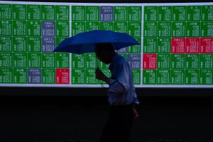 Stocks upbeat, dollar wobbles as Fed hike bets recede