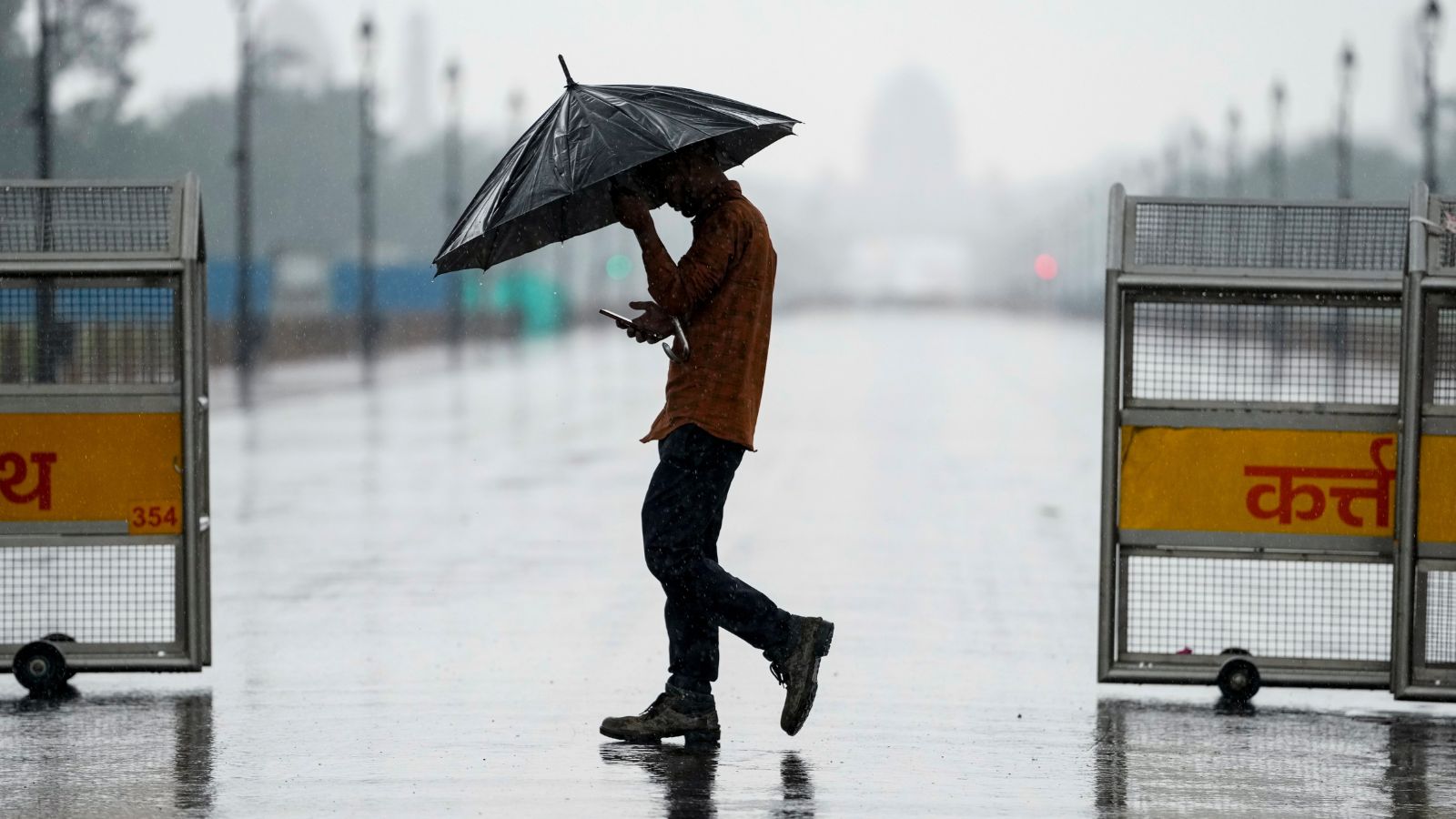 Gloomy skies prevail as rain lashes Delhi, IMD predicts another wet spell around midnight